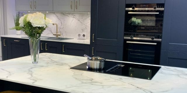 What’s New In The World Of Kitchen Appliances Dark Blue Traditional Kitchen White Worktop